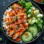 Delicious Bang Bang Chicken Bowl with colorful veggies and spicy sauce