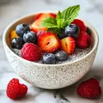 Overnight chia pudding topped with fresh berries in a stylish bowl