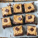Delicious peanut butter cheesecake brownies on a plate.